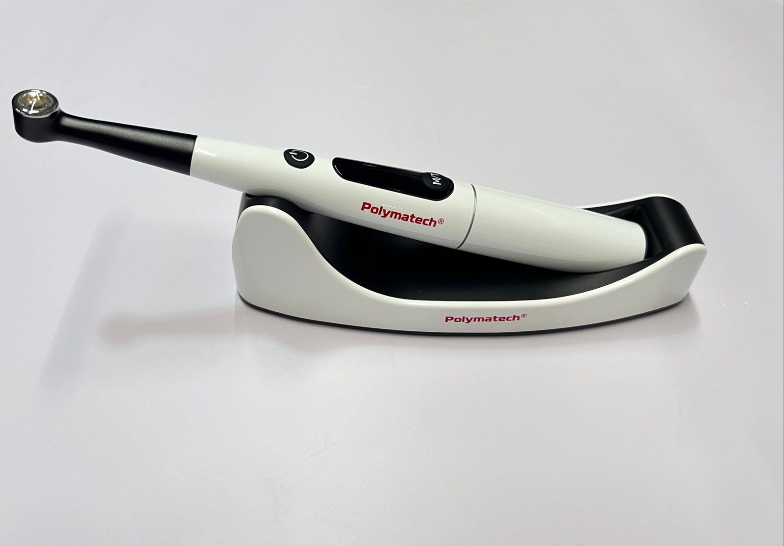 Polymatech Dental Curing Light DCL-100-E1 on its charging base